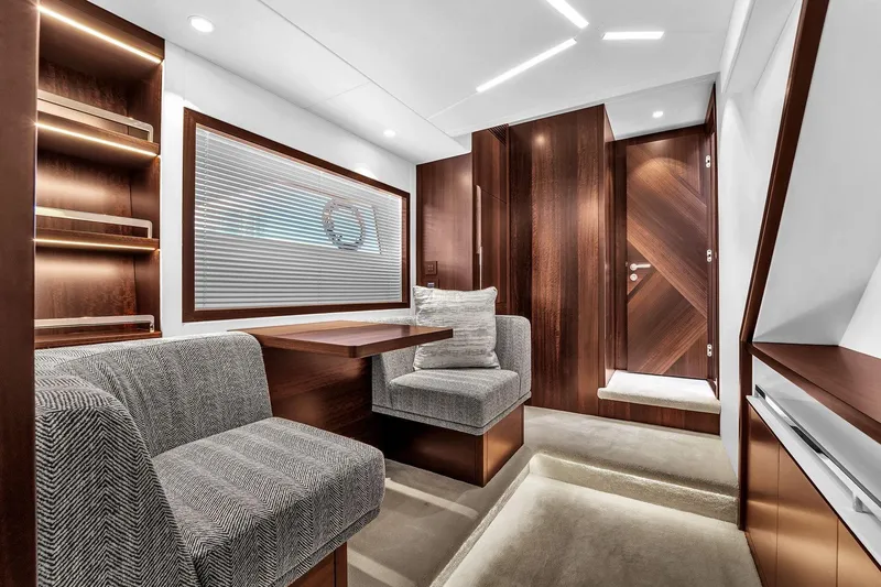 Slide: The Image of Luxurious interior of 2023 Sunseeker Manhattan 68 Pacific yacht with elegant wood finishes. - 63