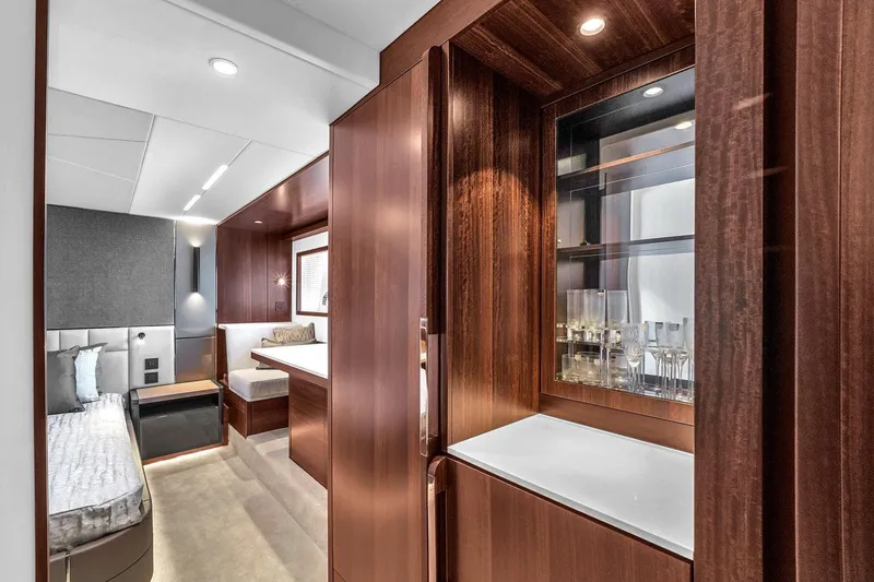 Slide: The Image of Luxurious interior of 2023 Sunseeker Manhattan 68 Pacific yacht with elegant wood finishes. - 66