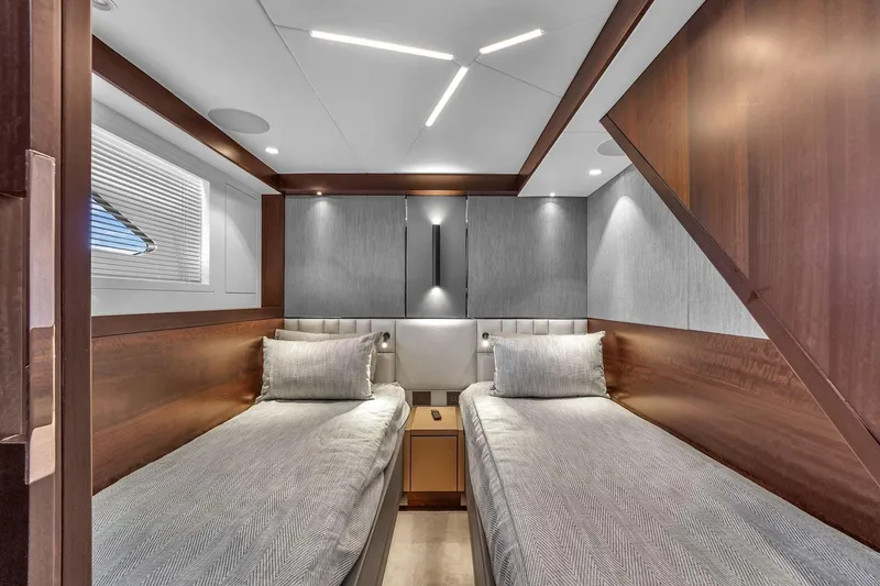 Slide: The Image of Luxurious twin cabin interior of 2023 Sunseeker Manhattan 68 Pacific yacht. - 80