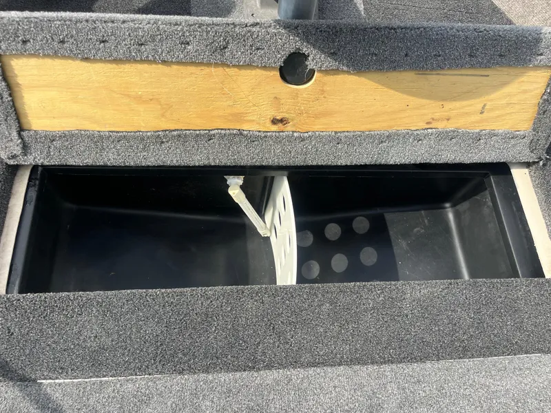 Slide: The Image of 2002 Fisher 16 Pro Avenger boat at lakeside. - 41