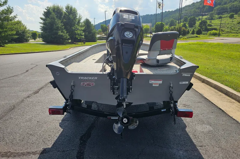 Slide: The Image of 2015 Tracker GV16 LAKER DLX boat with 25 HP motor, parked on asphalt. - 3