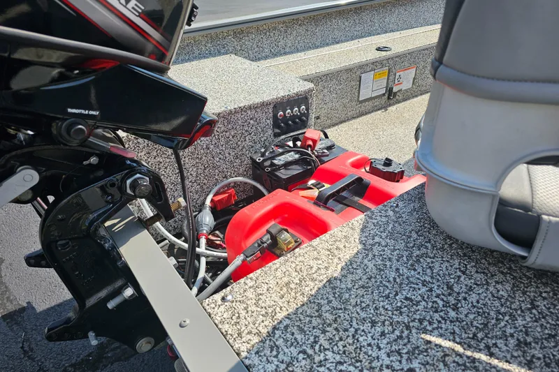 Slide: The Image of 2015 Tracker GV16 LAKER DLX boat interior with seating and storage compartments. - 4