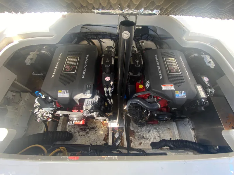 Slide: The Image of 2006 Crownline 320 LS boat engine compartment with dual Volvo Penta engines. - 43