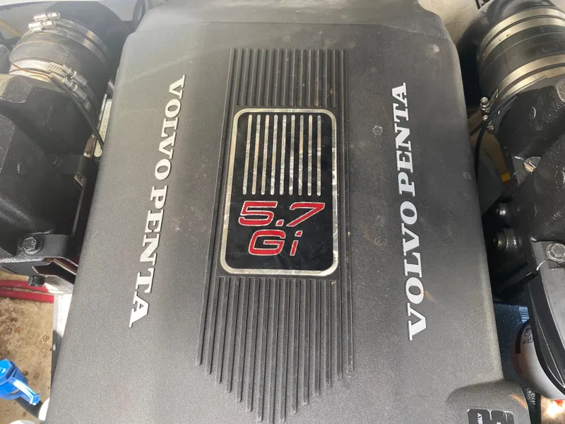 Slide: The Image of Volvo Penta 5.7 Gi engine in a 2006 Crownline 320 LS boat. - 44