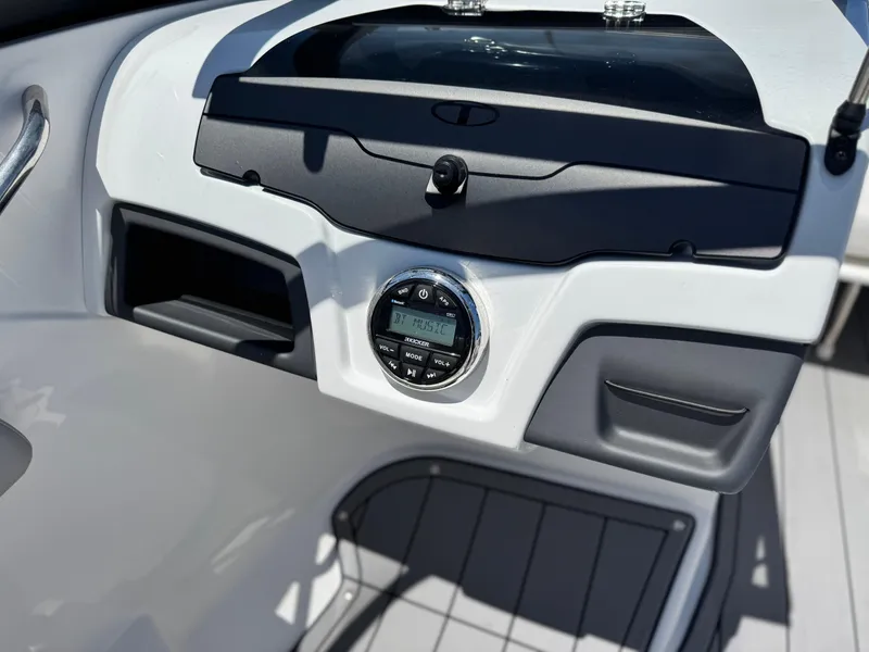 Slide: The Image of Dashboard of 2023 Tahoe 210 Si boat with modern audio system. - 20