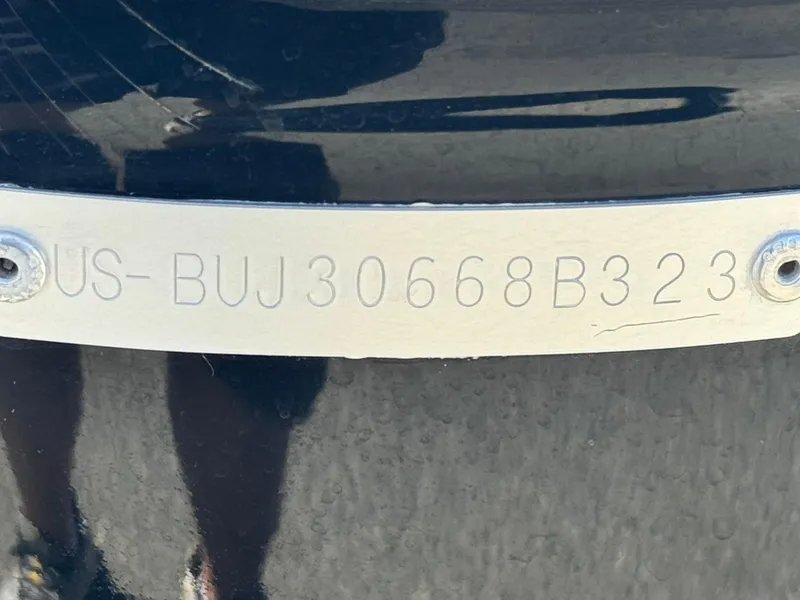 Slide: The Image of 2023 Tahoe 210 Si boat hull identification number (HIN) plate close-up. - 26