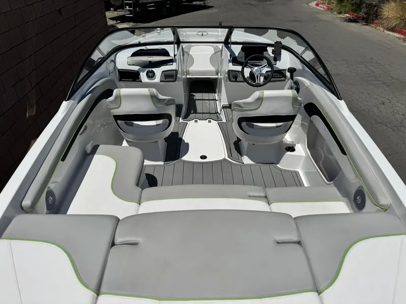 Slide: The Image of 2023 Tahoe 210 Si boat interior with modern seating and sleek design. - 8