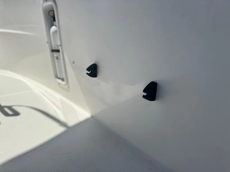 Slide: The Image of Edgewater 170CC 2017 boat interior detail with hooks and compartment. - 19