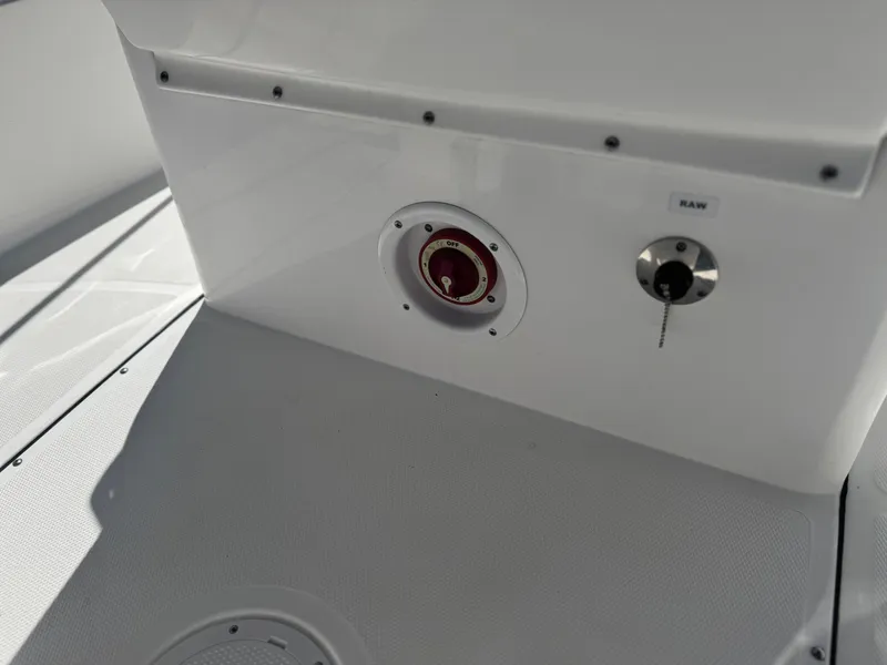 Slide: The Image of 2017 Edgewater 170CC boat interior with control panel and switches. - 23