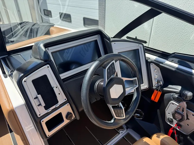 Slide: The Image of 2021 Supra SL 550 dashboard with modern steering wheel and digital displays. - 10