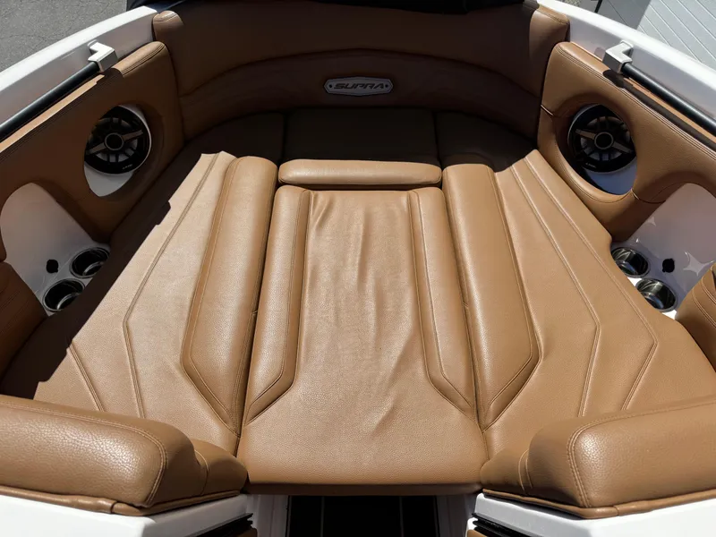 Slide: The Image of Luxurious tan leather seating in 2021 Supra SL 550 boat interior. - 7