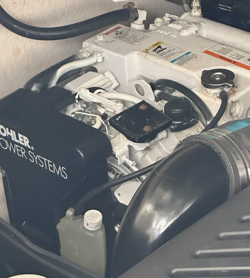 Slide: The Image of Engine compartment of a 2006 Sea Ray 340 Sundancer with Kohler power system. - 30