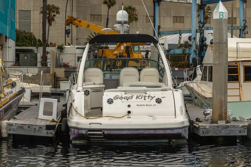 Slide: The Image of 2006 Sea Ray 340 Sundancer docked at marina, labeled "Good Kitty," Redondo Beach, CA. - 8