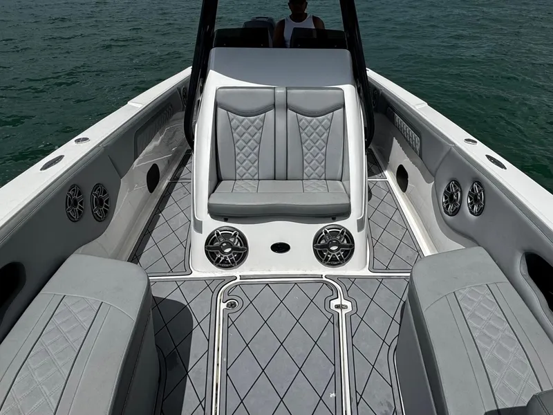 Slide: The Image of 2023 Avanti 36 boat interior with gray seating and stylish flooring on the water. - 10