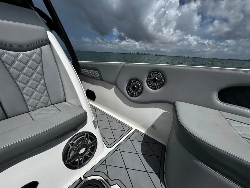Slide: The Image of Luxurious interior of 2023 Avanti 36 boat with quilted seats and marine speakers. - 18