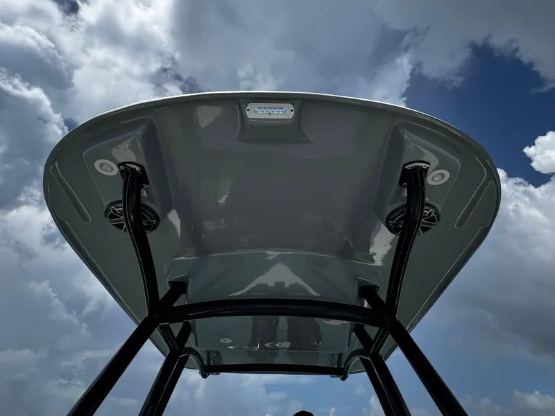 Slide: The Image of 2023 Avanti 36 boat canopy against a cloudy sky background. - 19