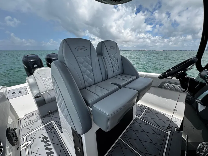 Slide: The Image of 2023 Avanti 36 boat interior with luxurious seating and ocean view. - 21