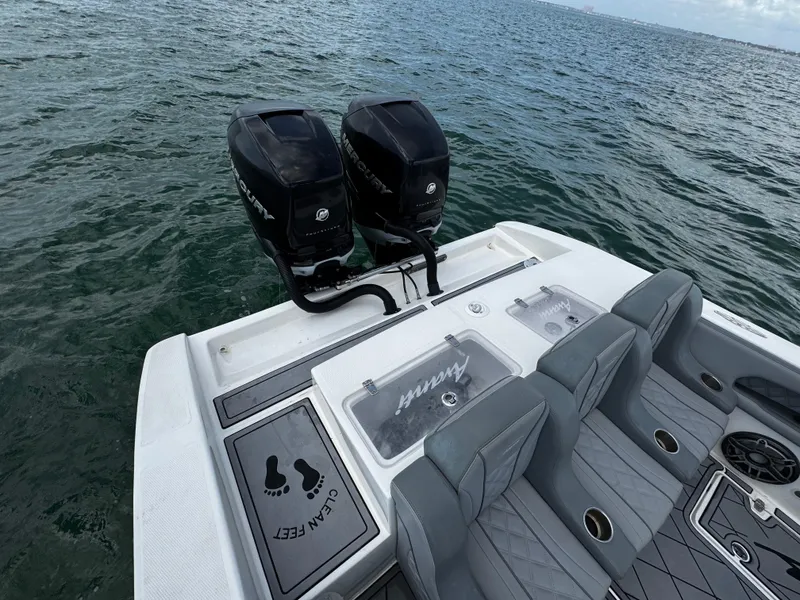 Slide: The Image of 2023 Avanti 36 boat with dual Mercury engines on open water. - 37