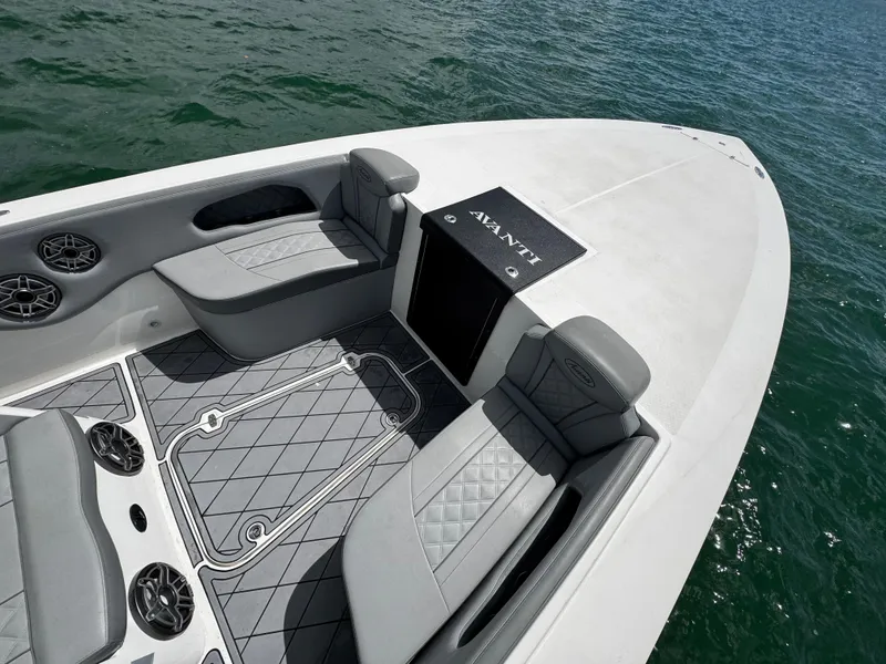 Slide: The Image of 2023 Avanti 36 boat interior with gray seating and stylish flooring on the water. - 7