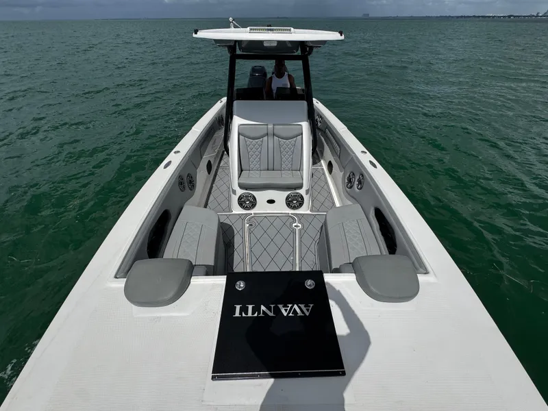 Slide: The Image of 2023 Avanti 36 boat on water, featuring sleek seating and modern design. - 9