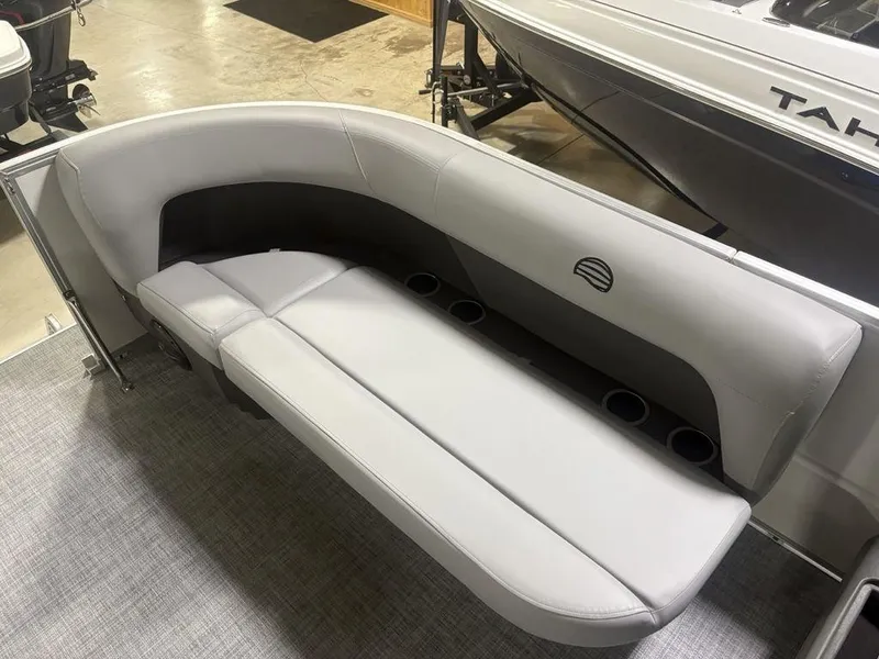 Slide: The Image of 2026 Sun Tracker PARTY BARGE® 16 DLX boat seating with cup holders, gray upholstery. - 4