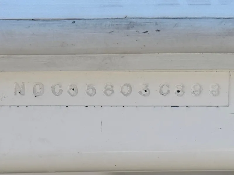 Slide: The Image of Hull identification number on a 1998 Nordic 25 Scandia boat. - 26