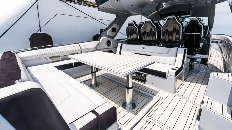 Slide: The Image of Luxurious interior of 2025 Cigarette 52 Thunder boat with sleek seating and modern design. - 13