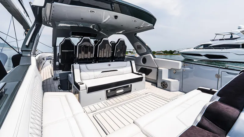 Slide: The Image of Luxurious 2025 Cigarette 52 Thunder yacht interior with sleek seating and modern design. - 14