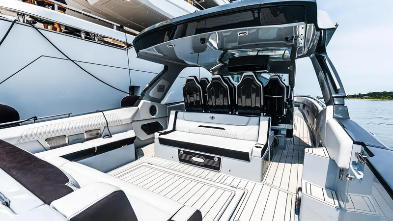 Slide: The Image of Luxurious 2025 Cigarette 52 Thunder yacht interior with sleek seating and modern design. - 15