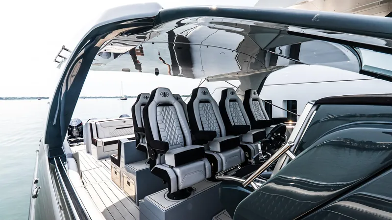 Slide: The Image of Luxurious interior of 2025 Cigarette 52 Thunder boat with sleek seating and modern design. - 18