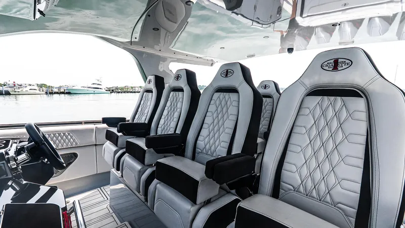 Slide: The Image of Luxurious interior seating of 2025 Cigarette 52 Thunder boat with diamond-stitched upholstery. - 19