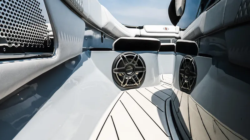 Slide: The Image of 2025 Cigarette 52 Thunder boat interior with sleek design and modern audio system. - 25