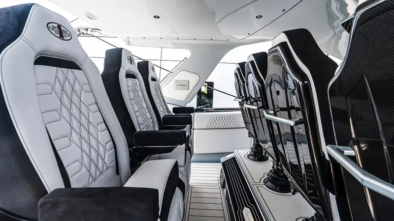 Slide: The Image of Luxurious interior seating of 2025 Cigarette 52 Thunder boat, featuring sleek, modern design. - 26