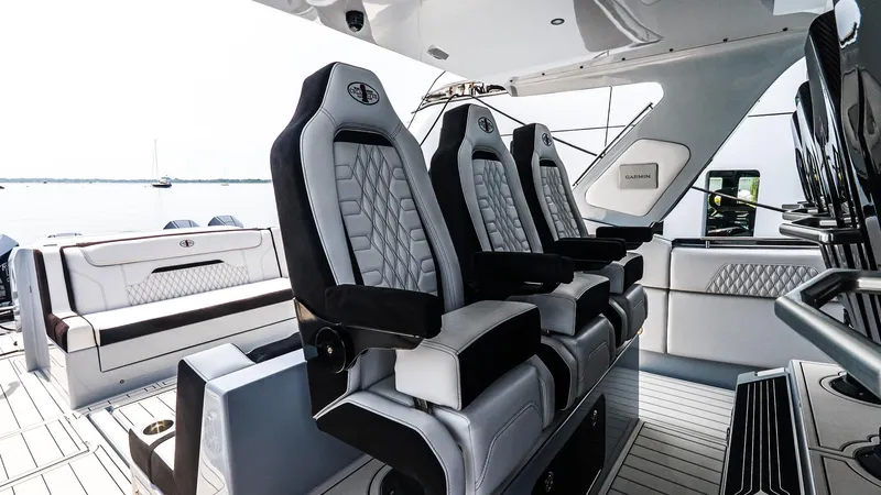 Slide: The Image of Luxurious interior of 2025 Cigarette 52 Thunder boat with plush seating and modern design. - 27