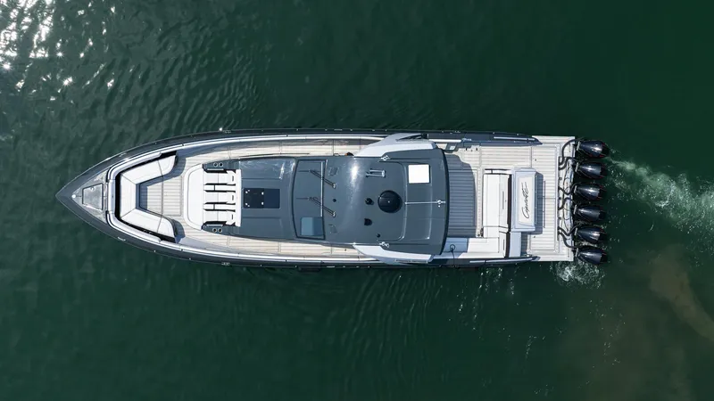 Slide: The Image of Aerial view of 2025 Cigarette 52 Thunder boat cruising on water. - 3