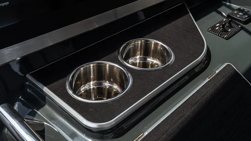 Slide: The Image of Stainless steel cup holders on 2025 Cigarette 52 Thunder boat interior. - 32