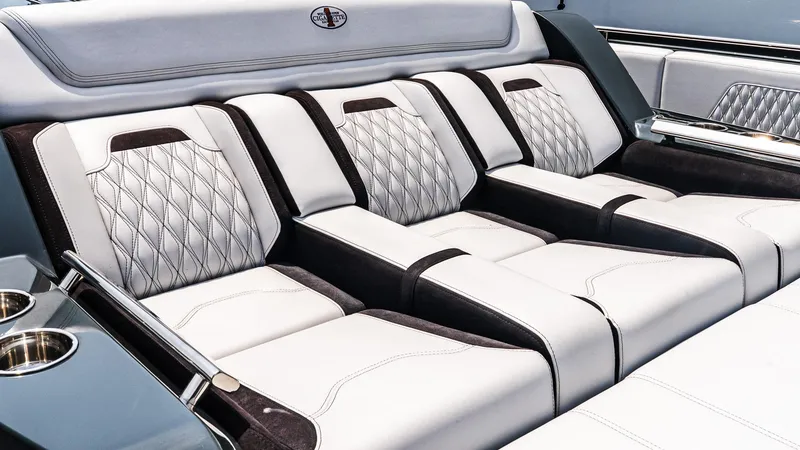 Slide: The Image of Luxurious interior seating of 2025 Cigarette 52 Thunder boat, featuring elegant diamond stitching. - 37