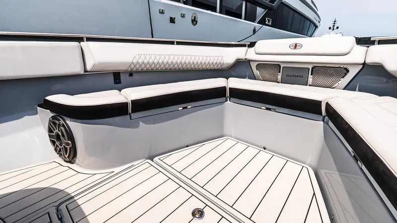 Slide: The Image of Luxurious seating area on 2025 Cigarette 52 Thunder boat with sleek design and premium materials. - 39