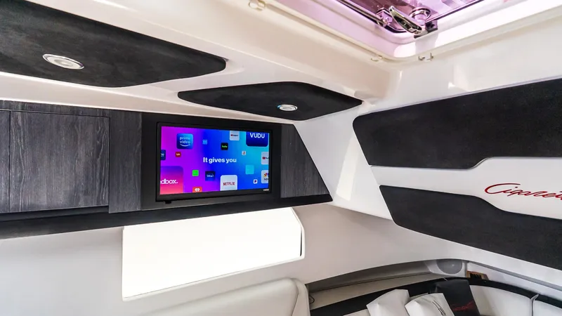 Slide: The Image of Interior of 2025 Cigarette 52 Thunder boat with modern entertainment system. - 44
