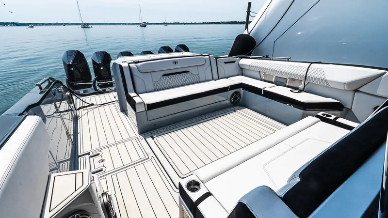Slide: The Image of Luxurious 2025 Cigarette 52 Thunder boat interior with sleek seating and modern design. - 9
