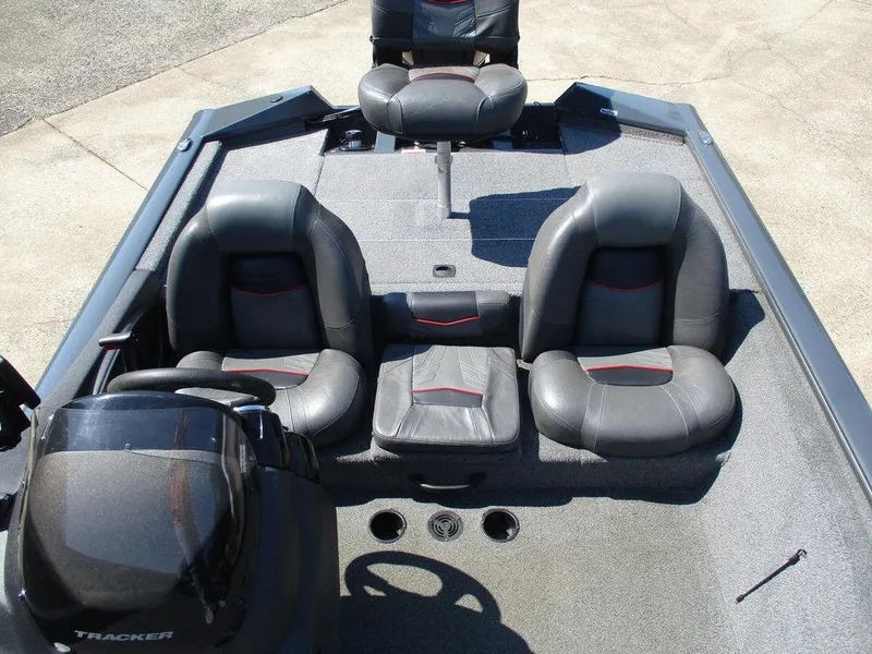 Slide: The Image of 2021 Tracker Pro Team™ 190 TX boat interior with gray seating and steering console. - 7