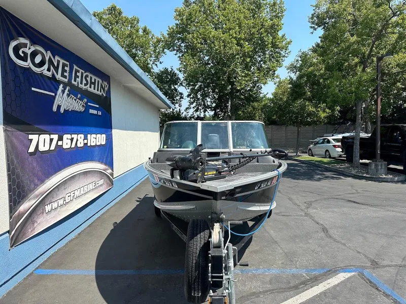 Slide: The Image of 2015 Alumacraft Competitor 165 Sport boat parked at Gone Fishin' Marine dealership. - 3