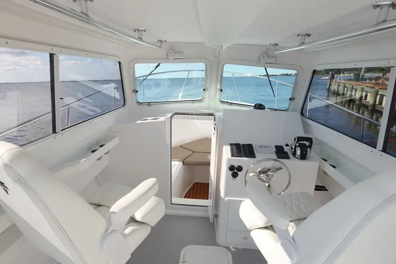 Slide: The Image of Interior of 2026 Steiger Craft 31 Fisherman boat with helm and seating. - 12