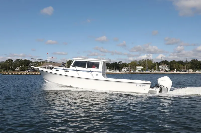 Slide: The Image of 2026 Steiger Craft 31 Fisherman cruising on a sunny day. - 8