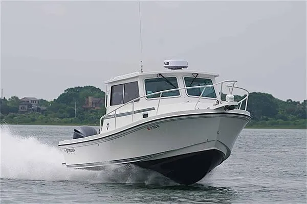Slide: The Image of 2026 Steiger Craft 28 Miami boat cruising on water, showcasing sleek design and performance. - 16
