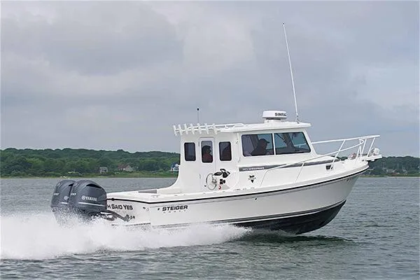 Slide: The Image of 2026 Steiger Craft 28 Miami boat cruising on water with Yamaha engine. - 17