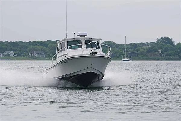 Slide: The Image of 2026 Steiger Craft 28 Miami boat cruising on a calm lake. - 18