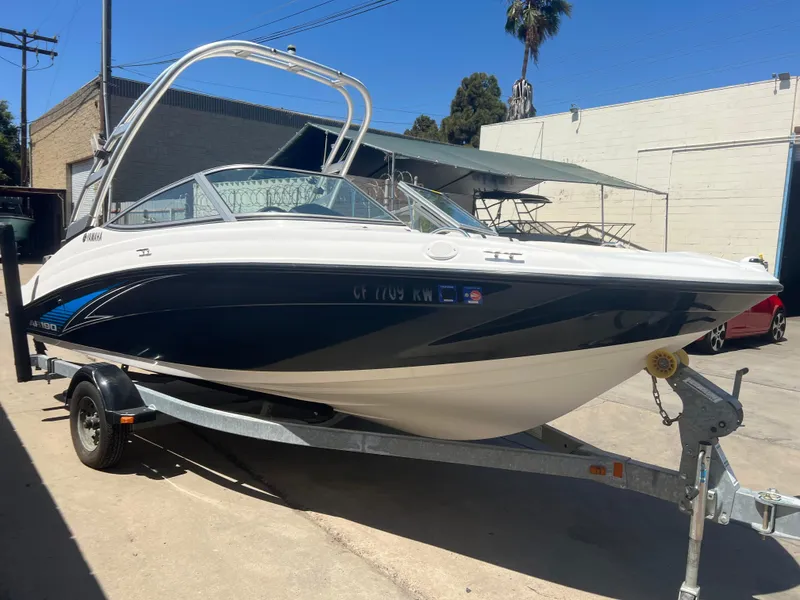 Slide: The Image of 2016 Yamaha AR190 boat on trailer in sunny outdoor setting. - 3