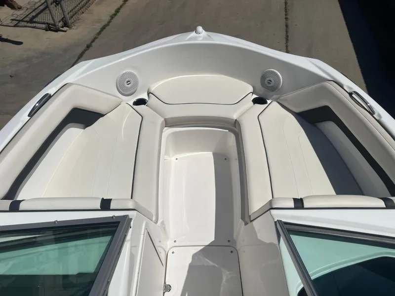 Slide: The Image of 2016 Yamaha Boats AR190 interior with white seating and speakers. - 7