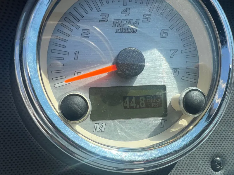 Slide: The Image of Close-up of a 2016 Yamaha AR190 boat tachometer showing 44.8 engine hours. - 9
